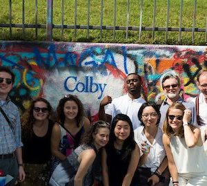 Students in front of graffiti